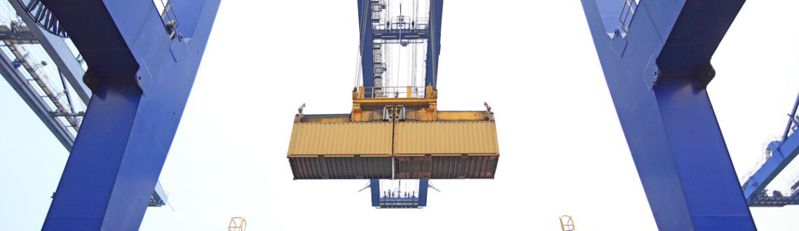 Rail crane loads containers for delivery of products to consumers